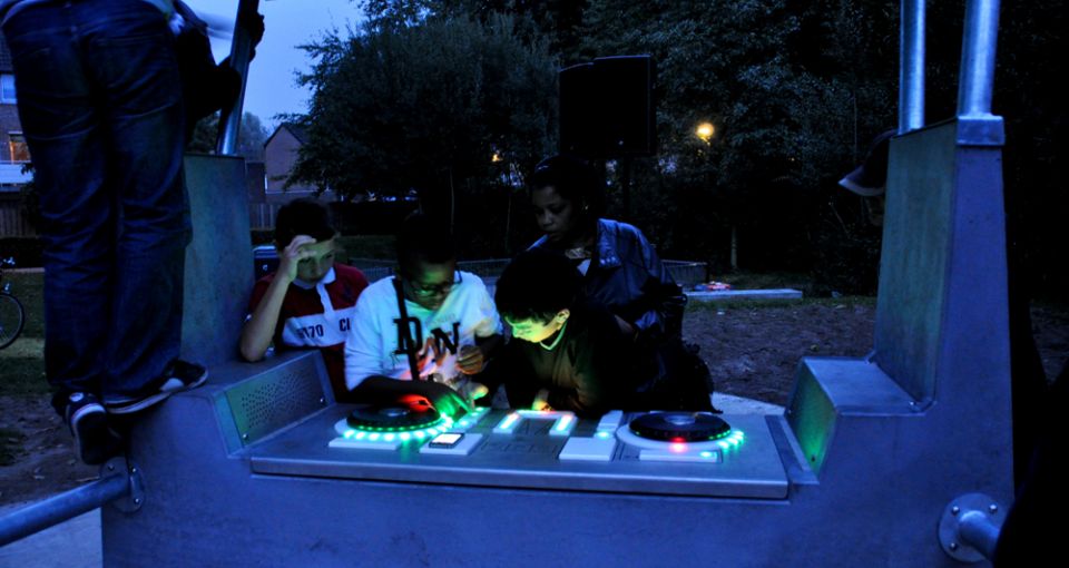 Scratch records with the community with this public DJ booth